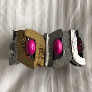 Anne-Marie Chagnon bracelet, gold and silver with pink accent.
